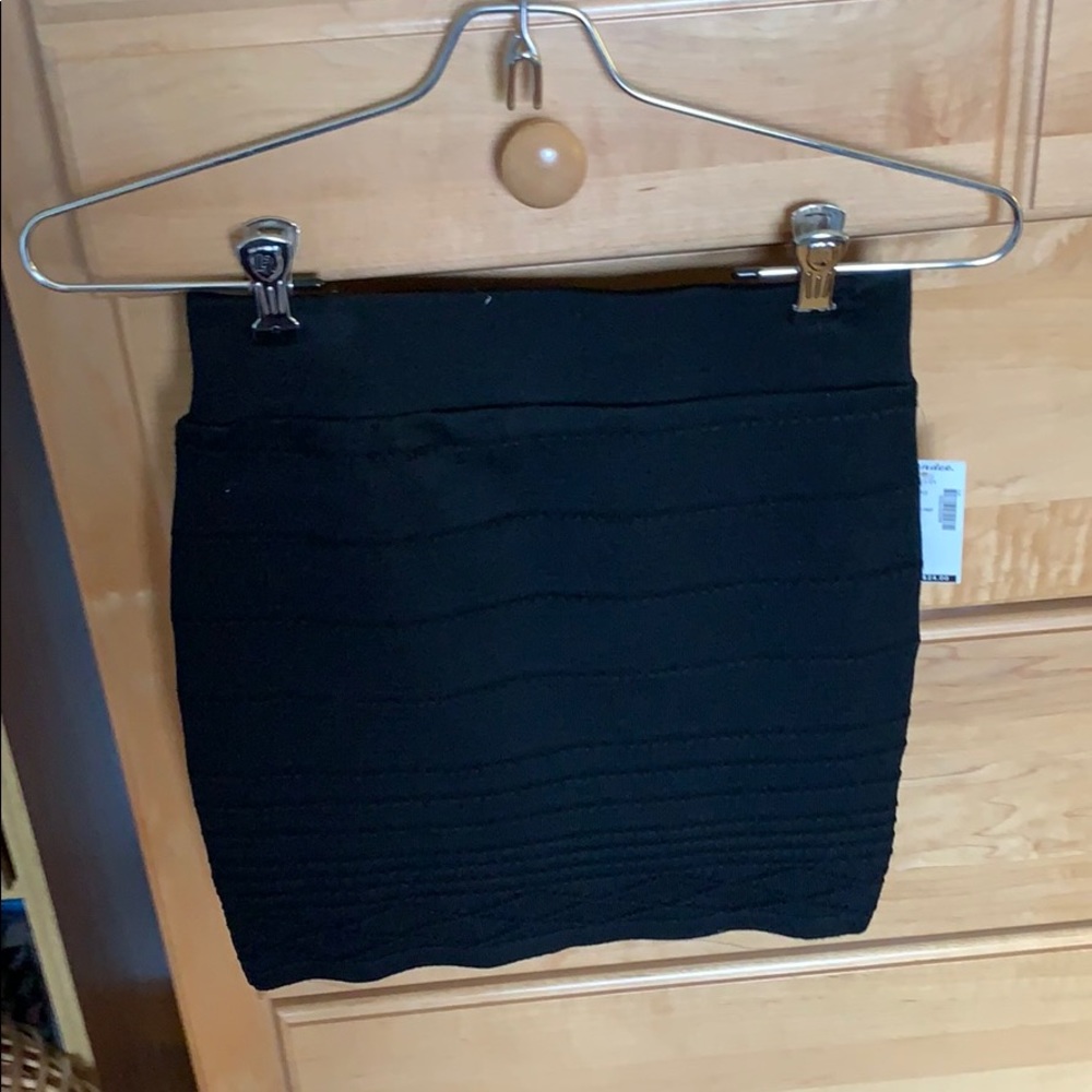 Textured black body con skirt
